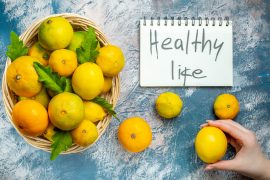 Top View Fresh Mandarins Wicker Basket Healthy Life Written Notepad Mandarin Woman Hand Blue White Surface