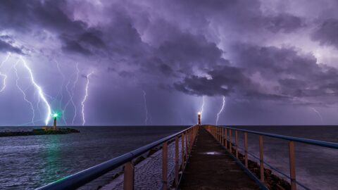 Port And Lighthouse Overnight Storm With Lightning In Port La Nouvelle