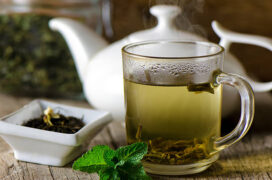 Glass Cup With Fresh Green Tea And Mint.