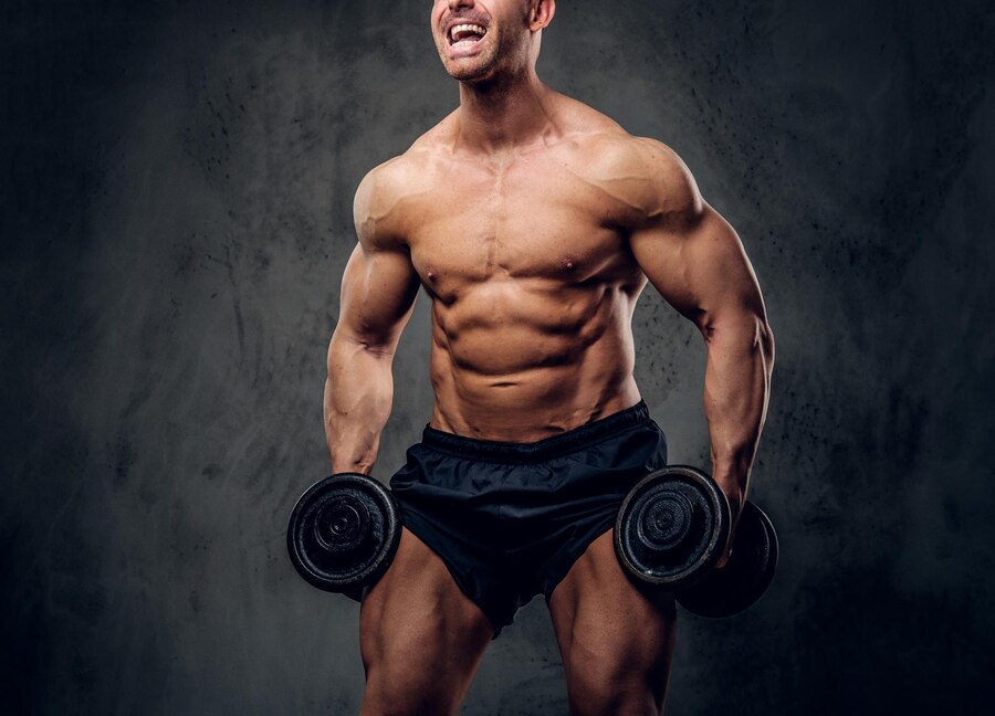 Happy Joyful Bodybuilder Is Doing Exercises With Barbels Showing His Muscules Dark Background 613910 17425